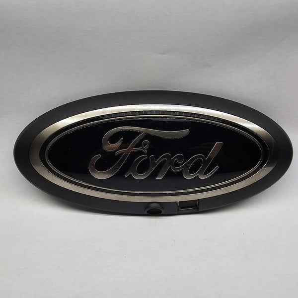 Damaged Genuine OEM Ford Oval Replacement Emblem With Camera Mount JC34-8B262-CB